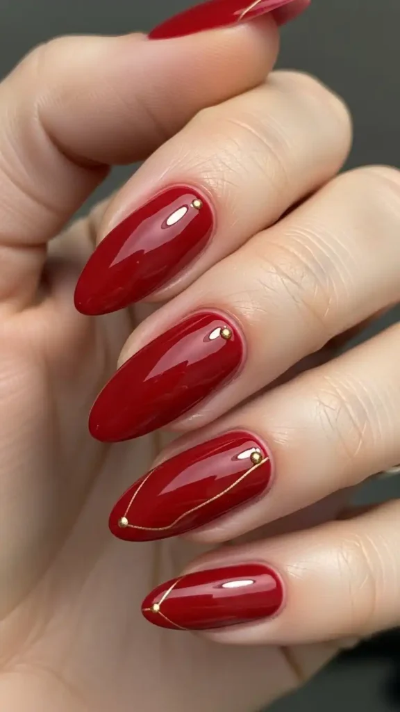 red-nails-with-tiny-gold-accents